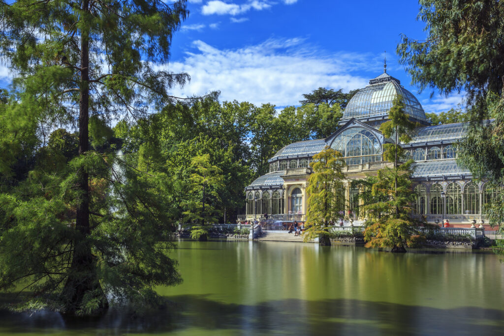 Famous Crystal Palace in Retiro Park, Madrid, Spain.